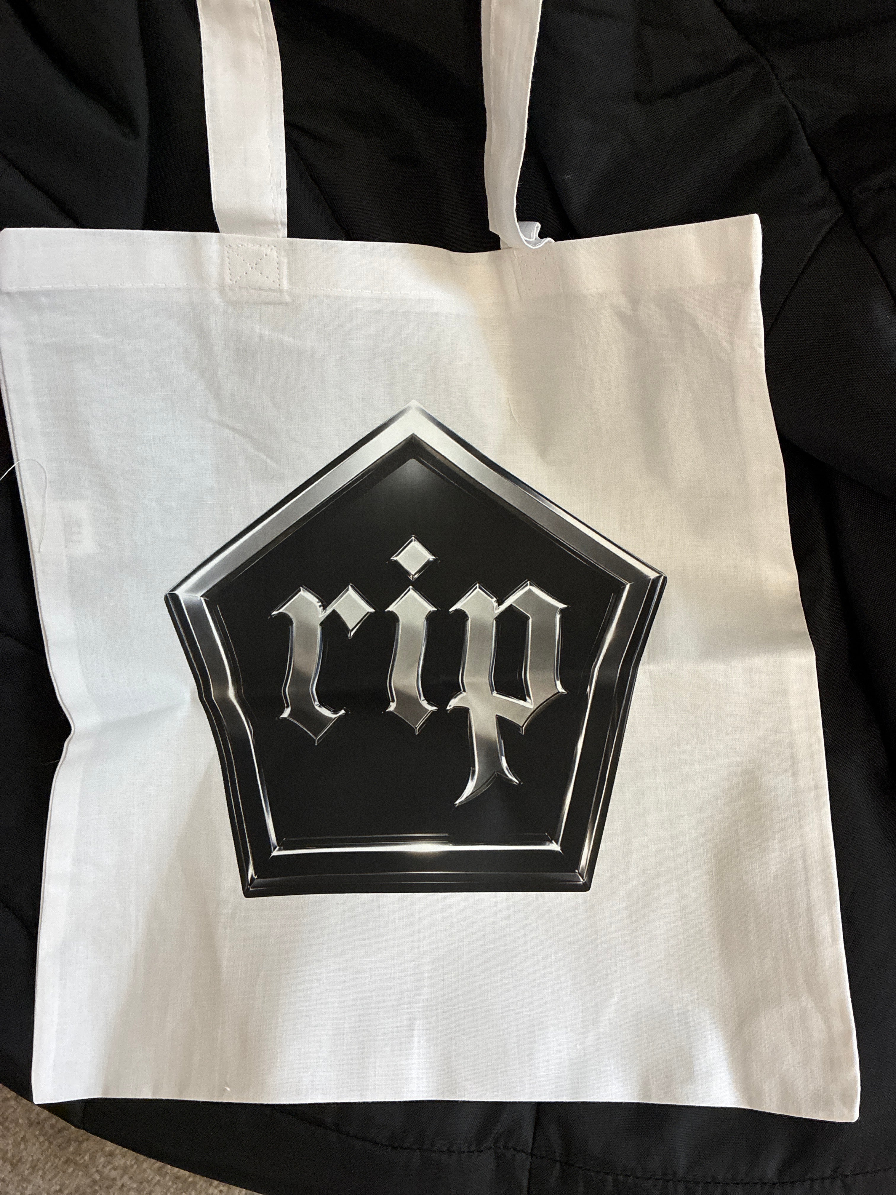 the RIP hive hexagon logo bag